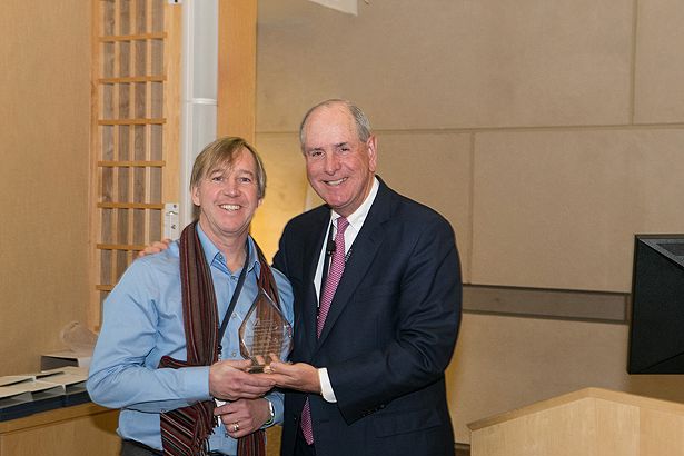 Kenneth Peterson, PhD, (left) accepts the Chancellor’s Award for Advancing Institutional Excellence in Civility from Chancellor Collins.