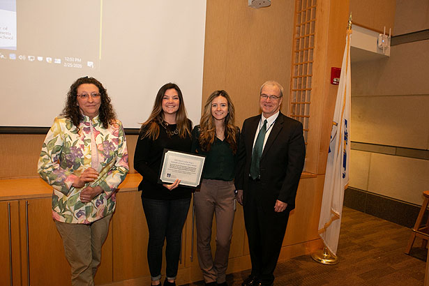 (from left) Heather-Lyn Haley, PhD, MLK Semester of Service Award winners Katherine Cooper, SOM ’22 and Rachel Anderson, SOM ’22, and Dean Terence Flotte 