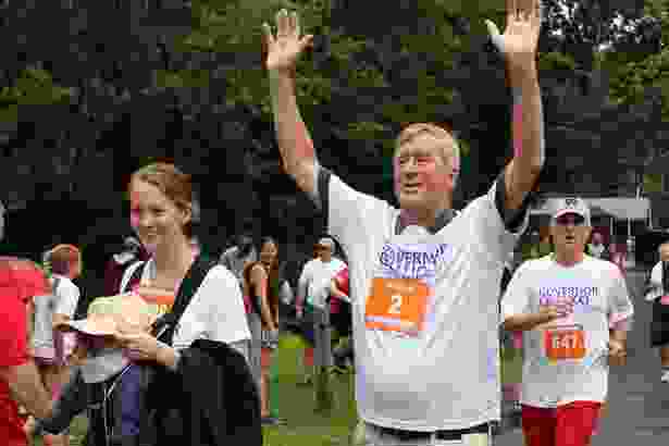 Former Gov. William Weld and daughter Mary Weld finish the race.