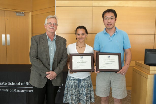 Dean Carruthers with Most Insightful Thesis Research Award recipients Laura Danai and Po-shen Chen
