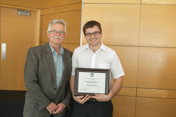 Dean Carruthers with Most Insightful Mid-Thesis Research award recipient Spencer Adams