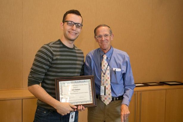 Dr. Durbin presents Eli Freiman with the New England Pediatric Society Award.
