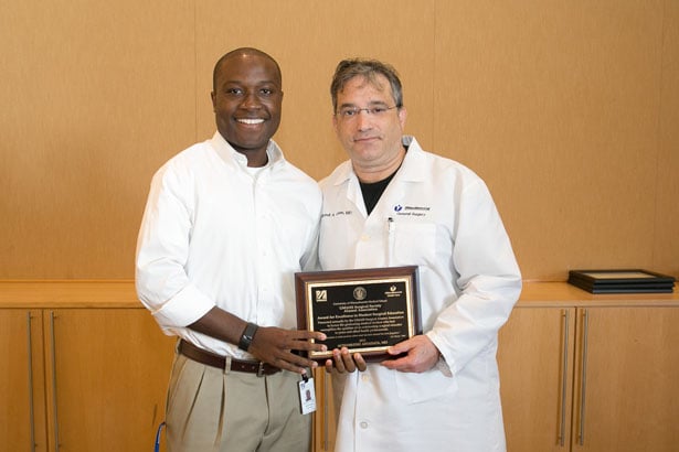 Dr. Cahan presented Achankeng Afiadata with the UMass Surgical Society Award for Excellence in Surgical Education. 