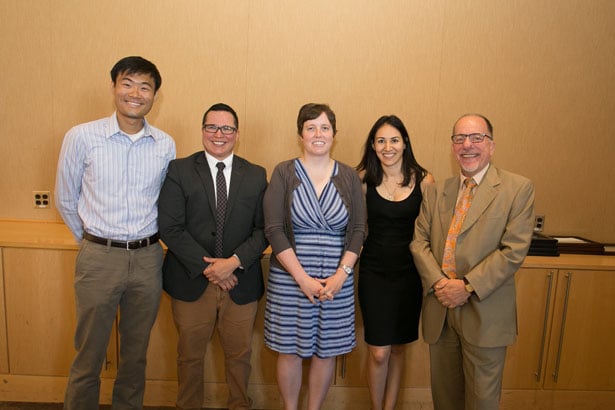 Dennis Dimitri, MD, presented the Massachusetts Medical Society Scholar Award for Academic Excellence to Shu Yang, Sebastian Ramos, Nicole Mushero, and Reem Abu-Libdeh.