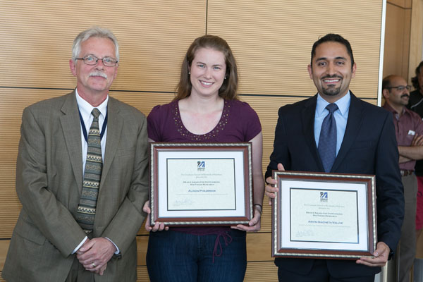 Dean Carruthers recognizes Alison Philbrook and Arvin Iracheta-Vellve with Dean’s Awards for Outstanding Mid-Thesis Research.