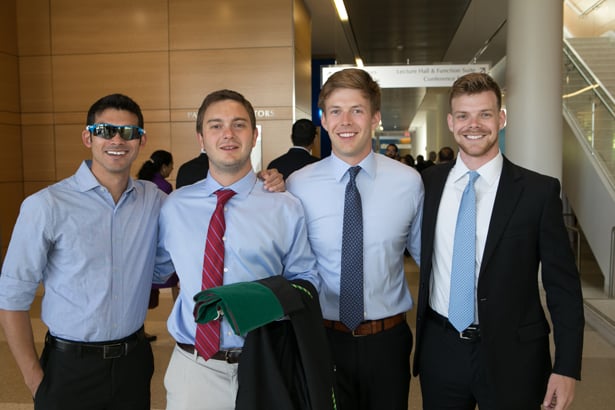 School of Medicine graduates Robby Martin, Alex Boardman and Eric Wilsterman with Eric’s brother Alex