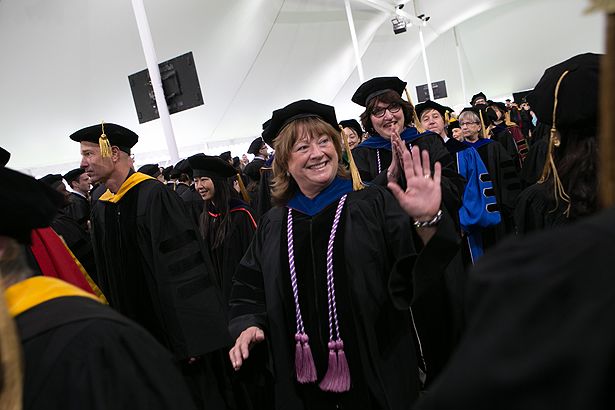 Jill Terrien waves to the nursing graduates.