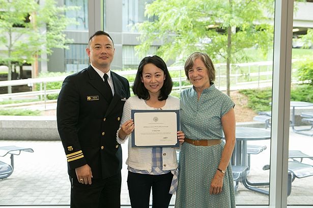 Yan Emily Yuan receives the Excellence in Public Health Award.
