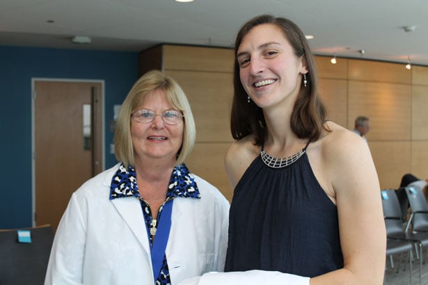 Karen Green, MD, the 2014 Chancellor’s Medalist for Distinguished Clinical Excellence, with SOM student Elena Stansky, whom she delivered 25 years ago.