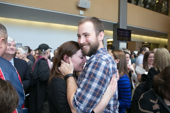 Michael Williams, SOM ’16, embraces Meghan Kennedy after learning where he is headed for residency.
