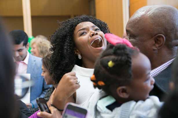 Chioma Okwara celebrates her match at the Brigham and Women’s Hospital with her father.