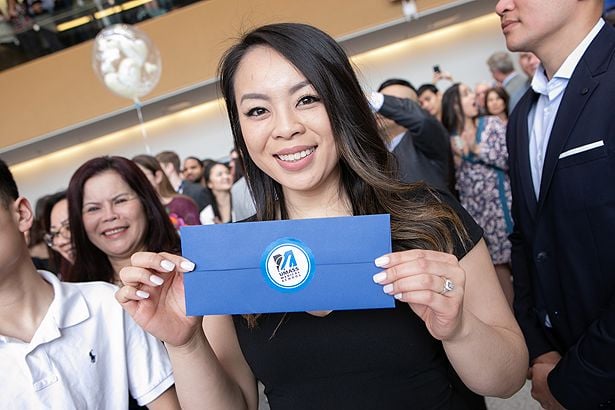 Meme Tran is all smiles at Match Day after receiving her envelope.