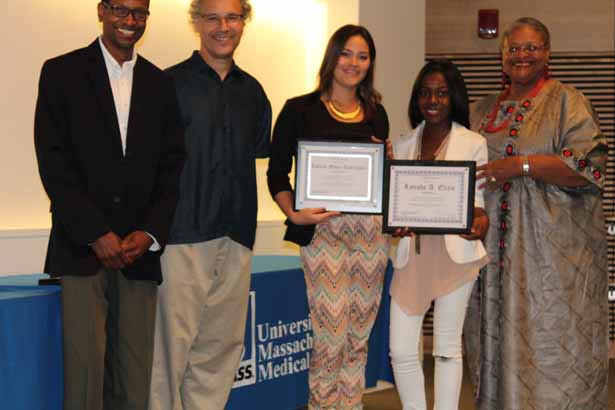 Tied in third place for best posters, University of Puerto Rico junior Lorein Moya Rodriguez and City College of New York senior Latisha Elijio are pictured with (from left) Dr. Lewis, Dr. Ambros and Principal Investigator Deborah Harmon Hines, PhD.