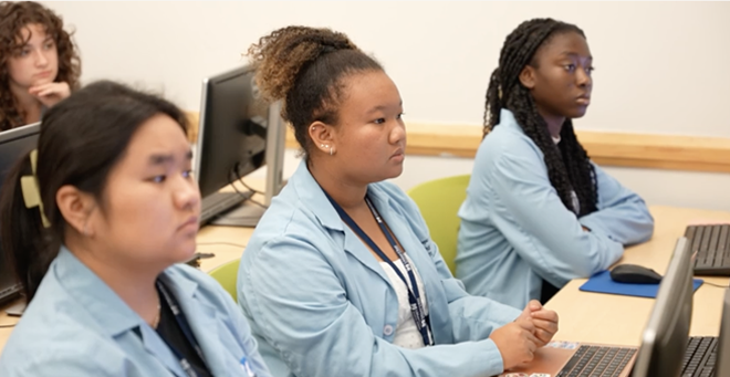 Participants in the 2023 High School Health Careers Program, listening
