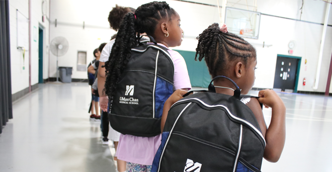 Worcester elementary students with new UMass Chan Medical School backpacks