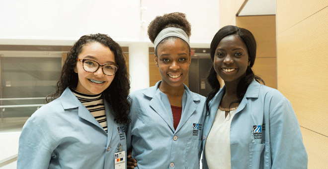 Doherty High School seniors and longtime friends (from left) Ina Perez, Jessica Atuahene and Tildah Fredua strengthened their “pact” at the 2016 High School Health Careers Program.