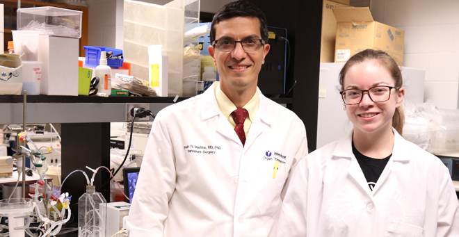 Paulo Martins, MD, PhD, and Jessica Perry