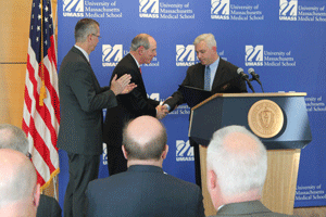 Mass. Secretary of Health and Human Services John Polanowicz, UMMS Chancellor Michael F. Collins, and Mass. Secretary of Veterans Affairs Coleman Nee at the announcement of a joint venture with the Veterans Administration to plan a new outpatient clinic on the UMMS campus. The announcement was made on Veterans Day at the medical school campus in Worcester.