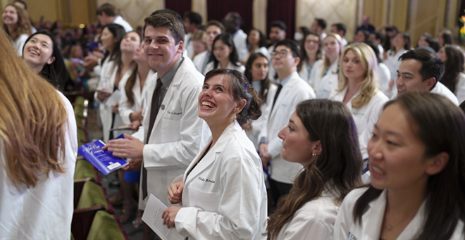 Christina Manxhari of Grafton Hill House shares a laugh with fellow medical students