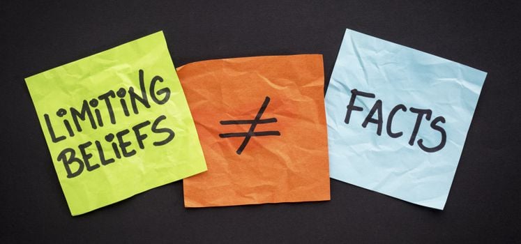 Notes saying, "Limiting Beliefs Are Not Facts"