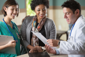 Nurse, BHC and PCP at front reception desk