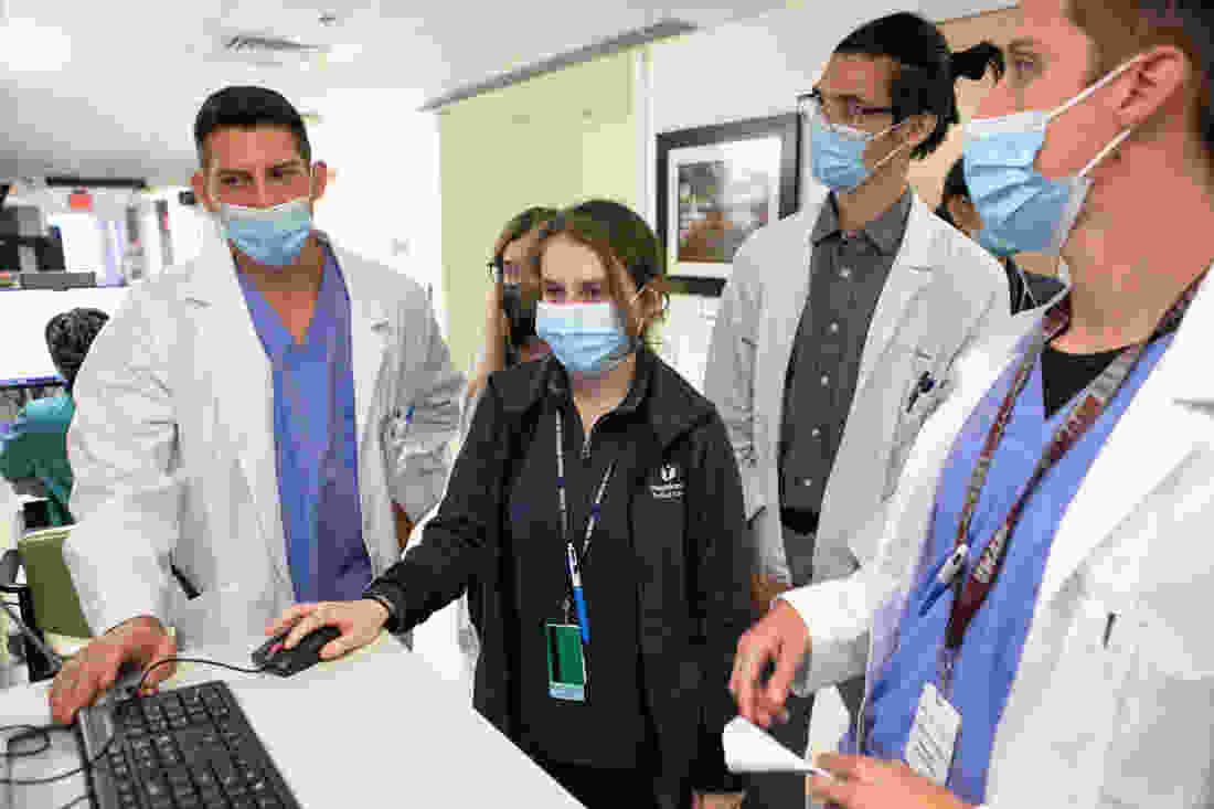 Neurology residents engaging in practical education experience in the clinical setting